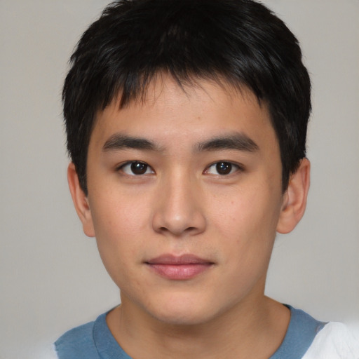 Neutral asian young-adult male with short  brown hair and brown eyes