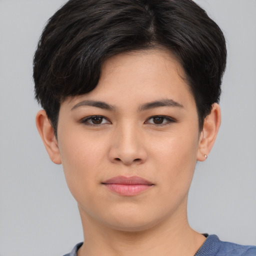 Joyful asian young-adult female with short  brown hair and brown eyes