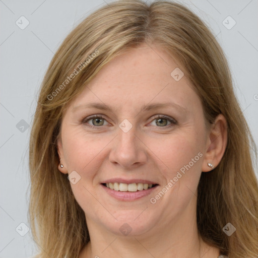 Joyful white young-adult female with long  brown hair and grey eyes