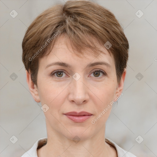 Joyful white adult female with short  brown hair and grey eyes