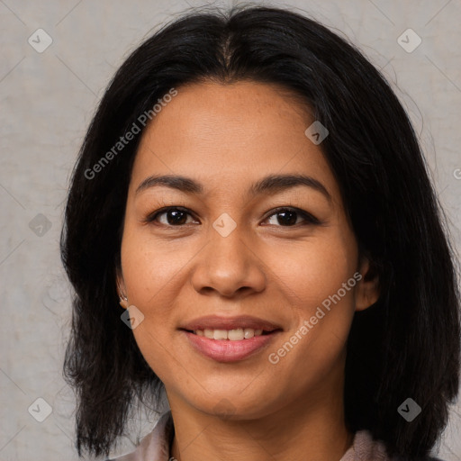 Joyful latino young-adult female with medium  black hair and brown eyes