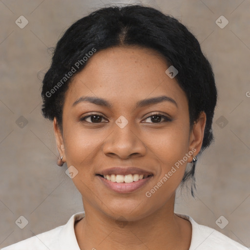 Joyful latino young-adult female with short  black hair and brown eyes