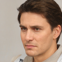 Neutral white adult male with short  brown hair and brown eyes