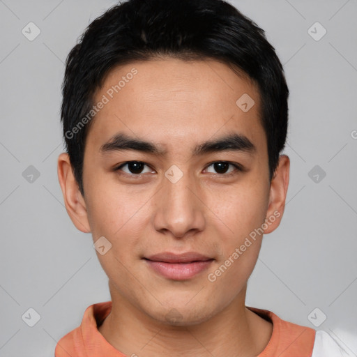 Joyful asian young-adult male with short  black hair and brown eyes