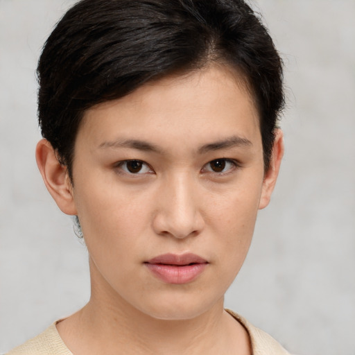Neutral white young-adult female with short  brown hair and brown eyes