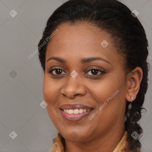 Joyful black young-adult female with medium  brown hair and brown eyes