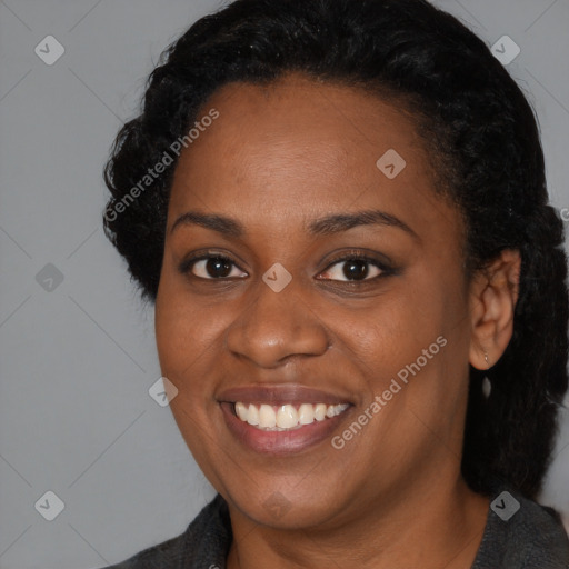 Joyful black young-adult female with medium  black hair and brown eyes