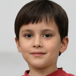 Joyful white child male with short  brown hair and brown eyes