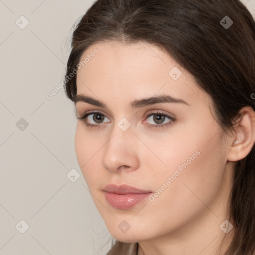 Neutral white young-adult female with medium  brown hair and brown eyes