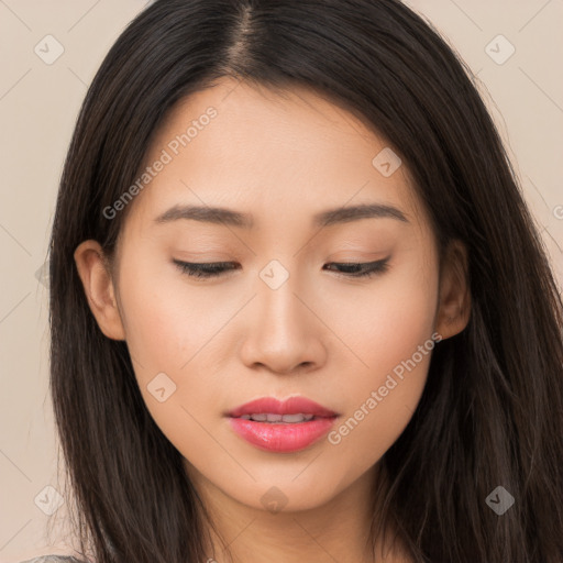 Joyful asian young-adult female with long  brown hair and brown eyes