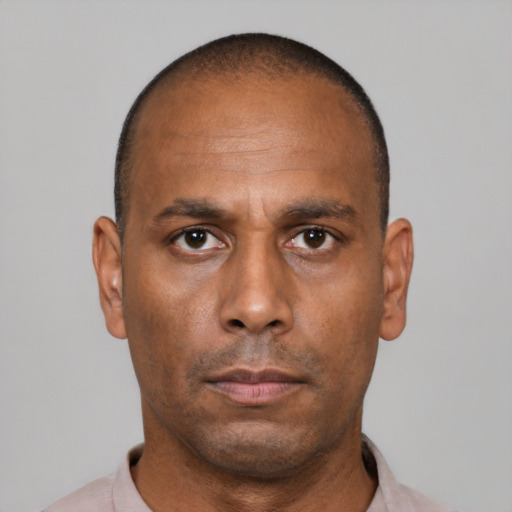 Neutral black adult male with short  brown hair and brown eyes