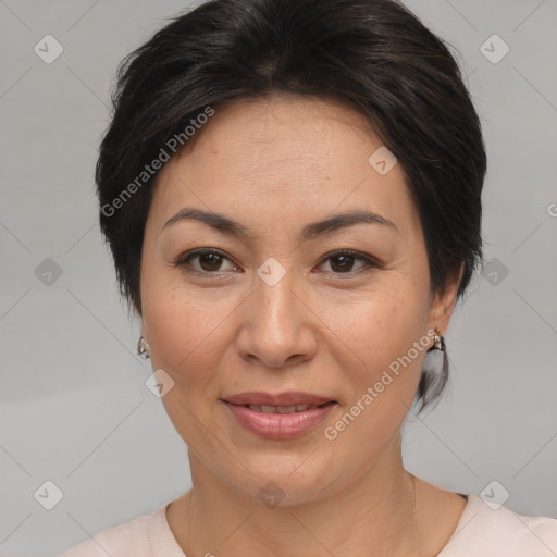 Joyful asian adult female with medium  brown hair and brown eyes