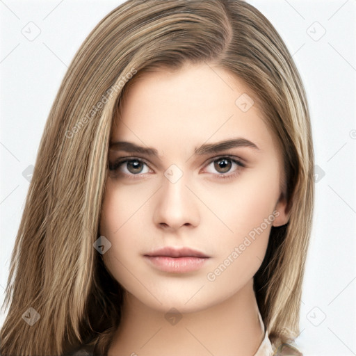 Neutral white young-adult female with long  brown hair and brown eyes