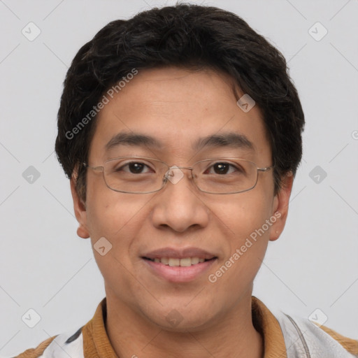 Joyful white adult male with short  brown hair and brown eyes