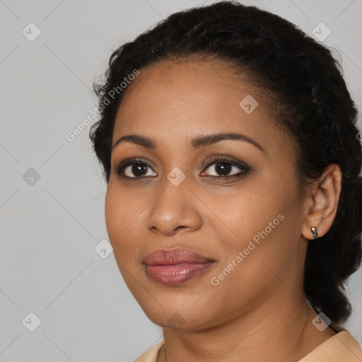 Joyful latino young-adult female with long  black hair and brown eyes