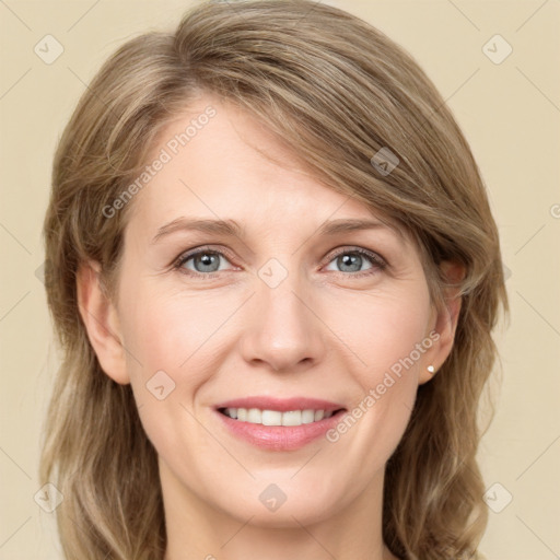 Joyful white young-adult female with medium  brown hair and green eyes