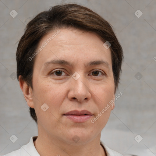 Joyful white adult female with short  brown hair and brown eyes