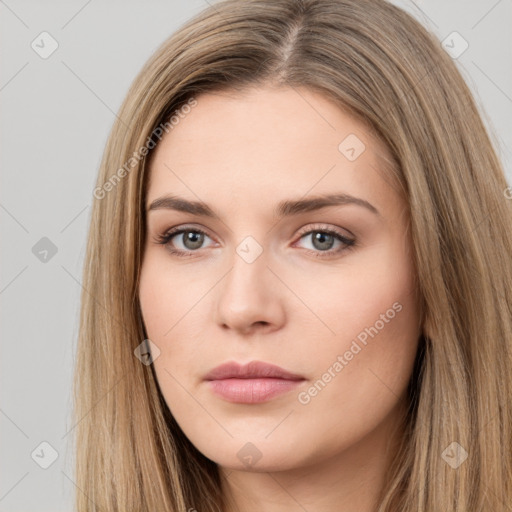 Neutral white young-adult female with long  brown hair and brown eyes