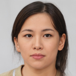 Neutral asian young-adult female with medium  brown hair and brown eyes