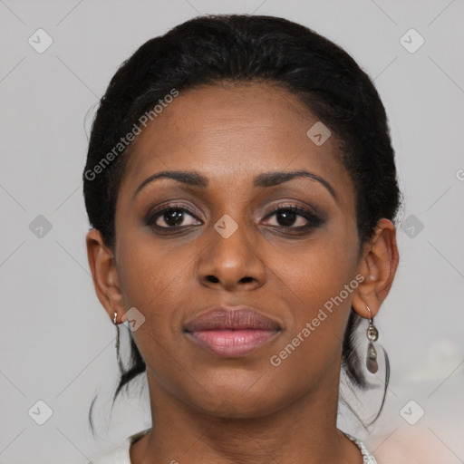 Joyful black young-adult female with medium  black hair and brown eyes