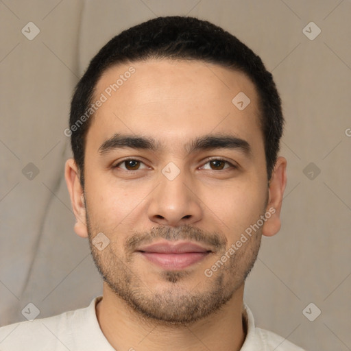 Joyful latino young-adult male with short  black hair and brown eyes