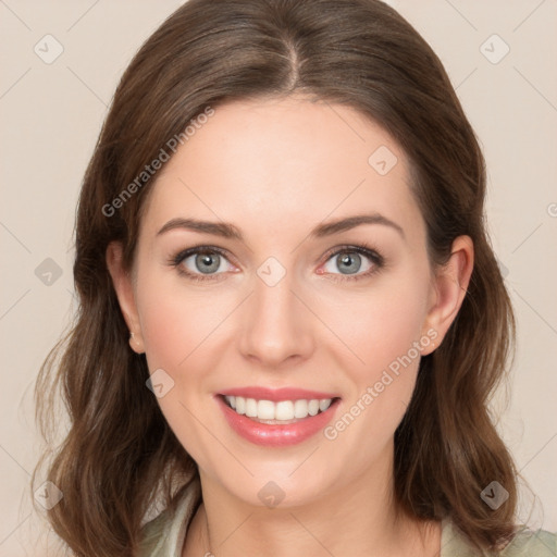 Joyful white young-adult female with medium  brown hair and green eyes