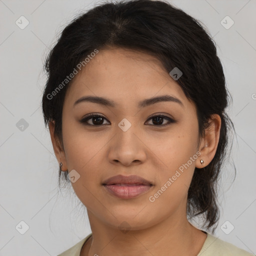 Joyful latino young-adult female with medium  brown hair and brown eyes