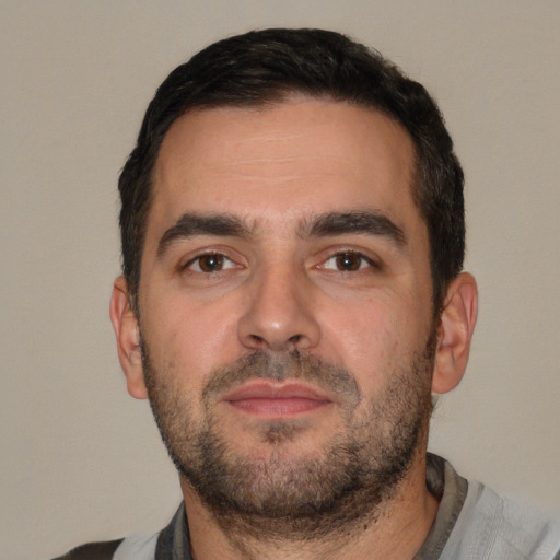 Neutral white adult male with short  brown hair and brown eyes