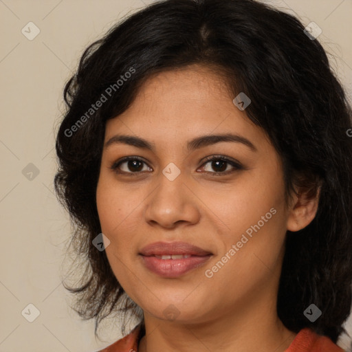 Joyful latino young-adult female with long  brown hair and brown eyes