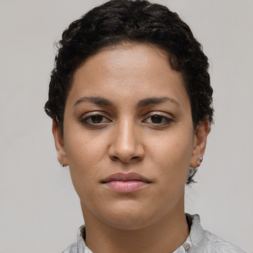 Neutral latino young-adult female with short  brown hair and brown eyes