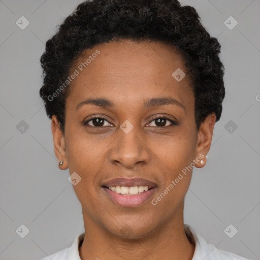 Joyful black young-adult female with short  black hair and brown eyes