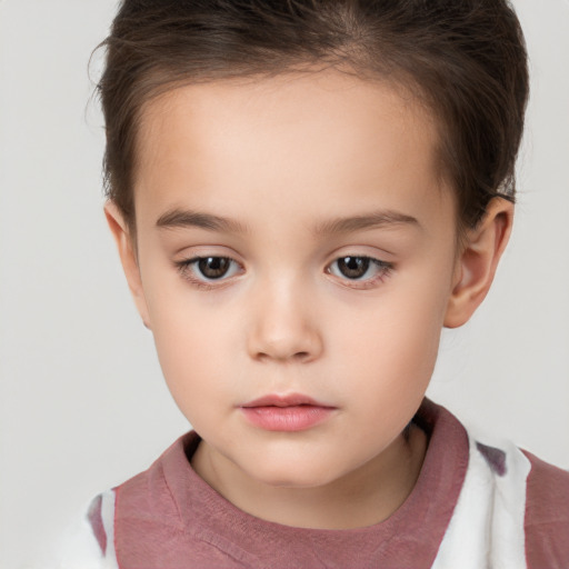 Neutral white child female with short  brown hair and brown eyes