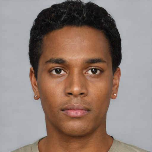 Neutral black young-adult male with short  black hair and brown eyes