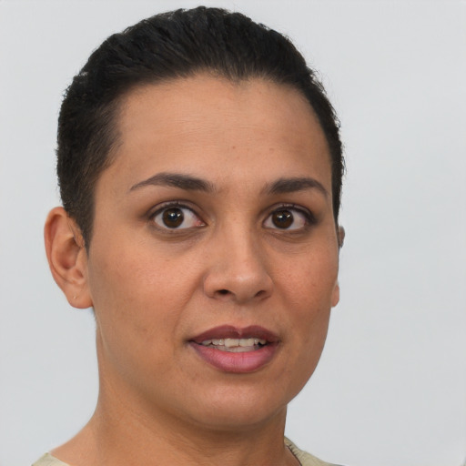 Joyful white young-adult female with short  brown hair and brown eyes