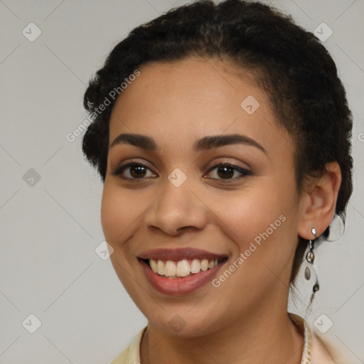 Joyful latino young-adult female with short  brown hair and brown eyes