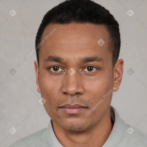 Neutral black young-adult male with short  black hair and brown eyes