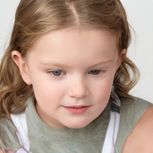 Joyful white child female with medium  brown hair and grey eyes