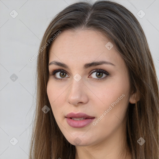 Neutral white young-adult female with long  brown hair and brown eyes