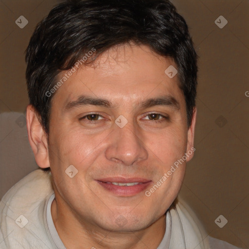 Joyful white adult male with short  brown hair and brown eyes