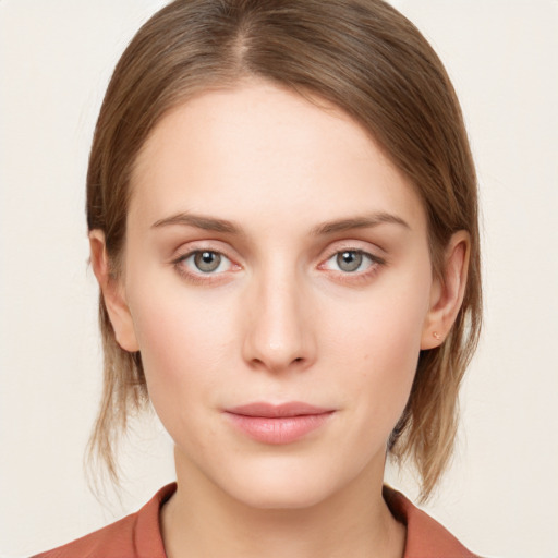 Neutral white young-adult female with medium  brown hair and blue eyes