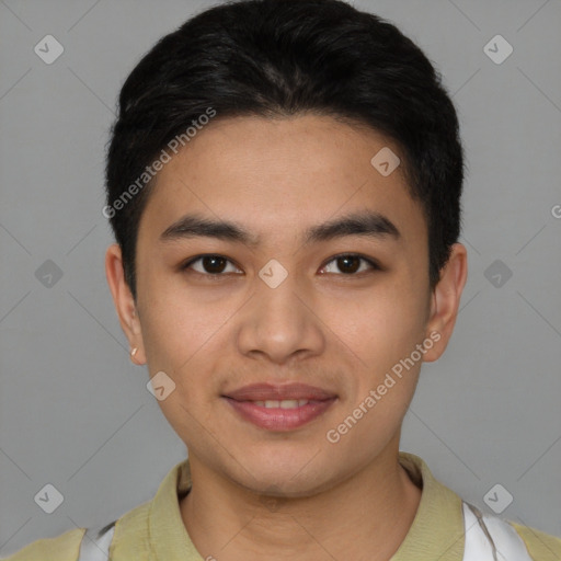 Joyful asian young-adult male with short  brown hair and brown eyes