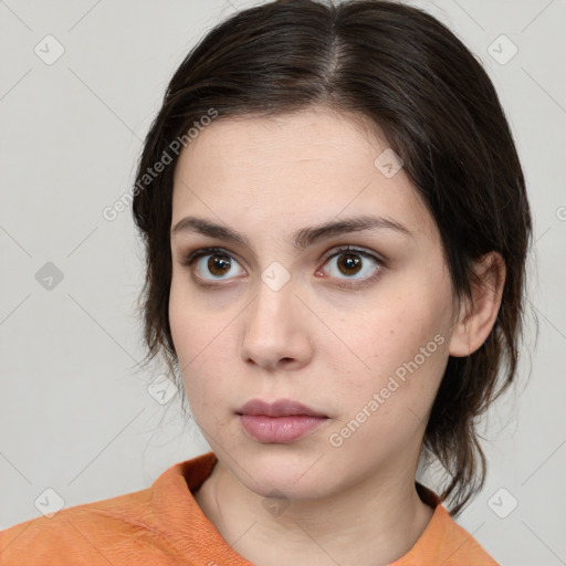 Neutral white young-adult female with medium  brown hair and brown eyes