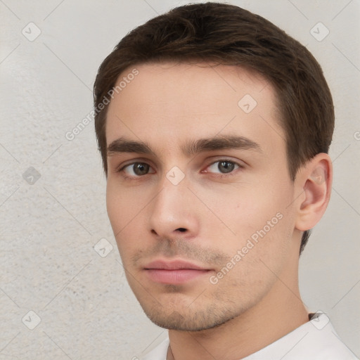 Neutral white young-adult male with short  brown hair and brown eyes