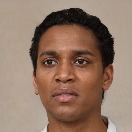 Neutral black young-adult male with short  black hair and brown eyes