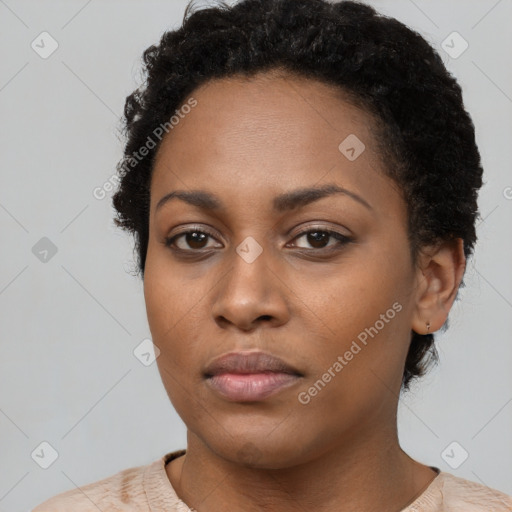 Neutral black young-adult female with short  black hair and brown eyes