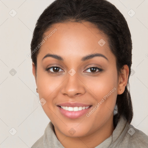 Joyful latino young-adult female with long  black hair and brown eyes