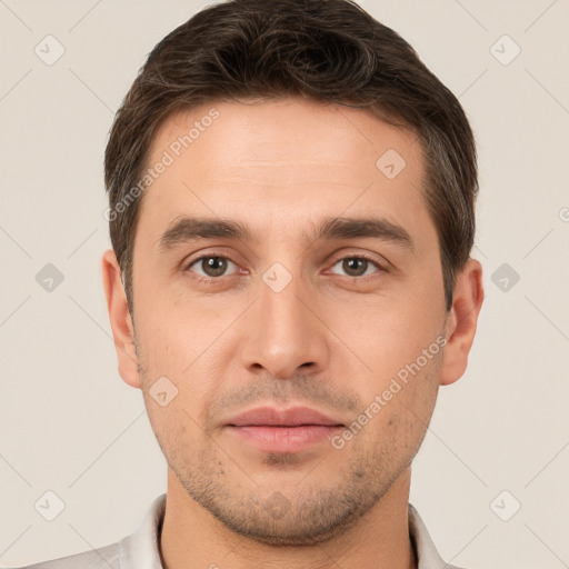 Neutral white young-adult male with short  brown hair and brown eyes