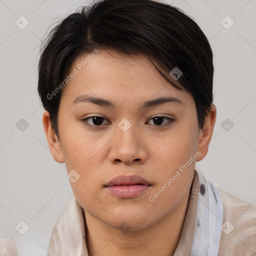 Joyful asian young-adult female with short  brown hair and brown eyes