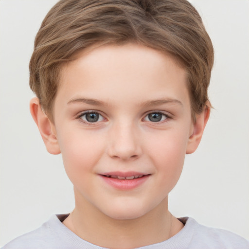 Joyful white child female with short  brown hair and grey eyes