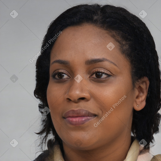 Joyful black young-adult female with medium  black hair and brown eyes